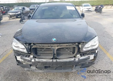 2015 BMW 750Li z USA, uszkodzony, nr VIN WBAYE8C55FD782112